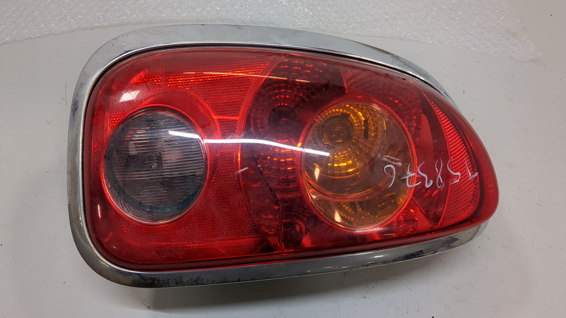 Фонарь задний левый