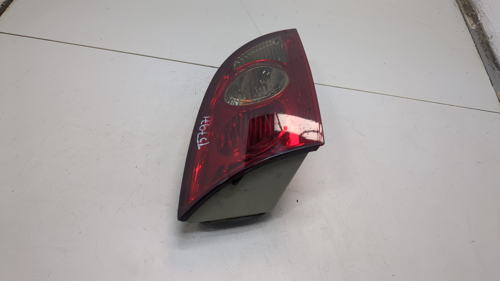 Фонарь задний левый