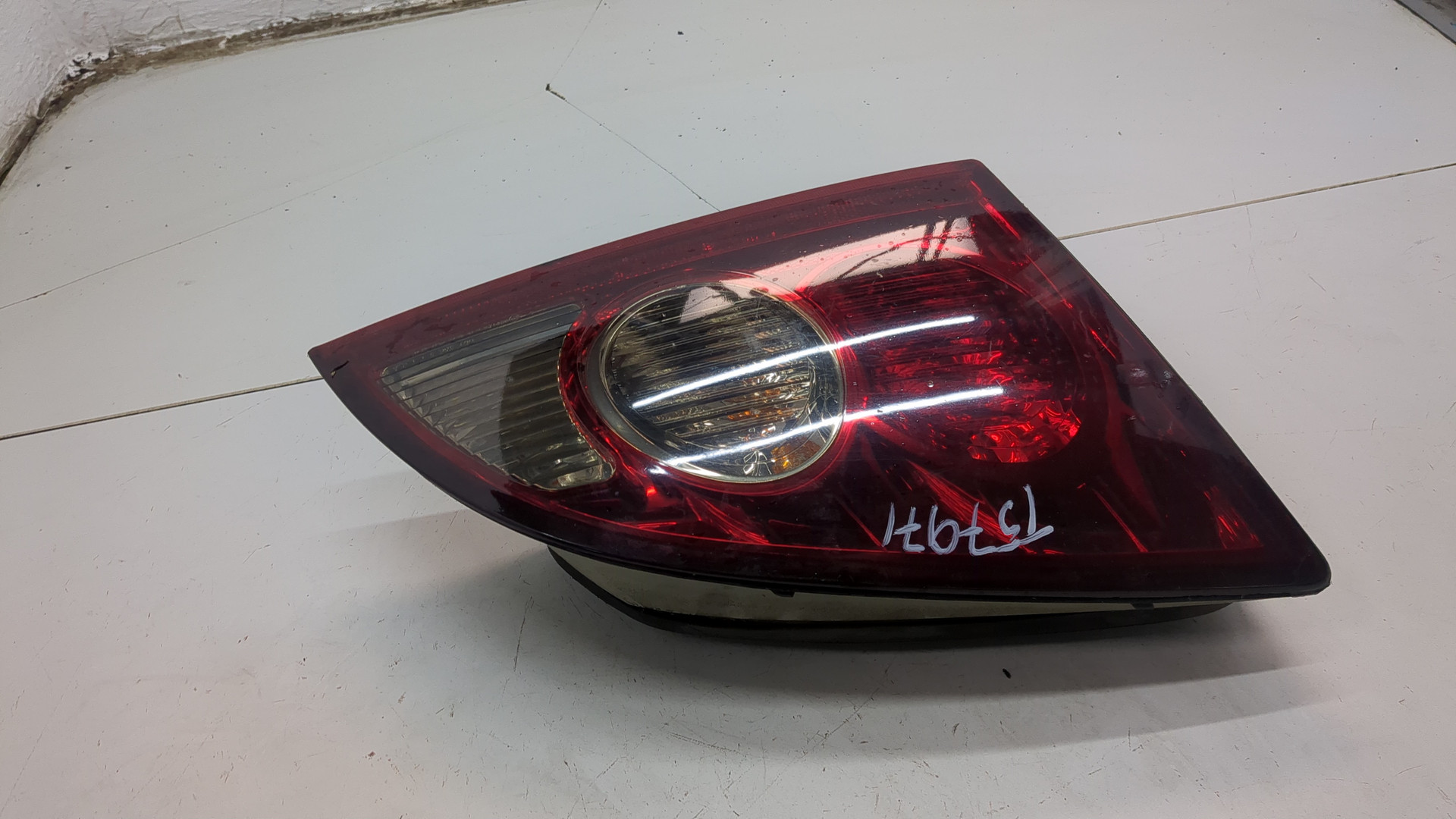 Фонарь задний левый