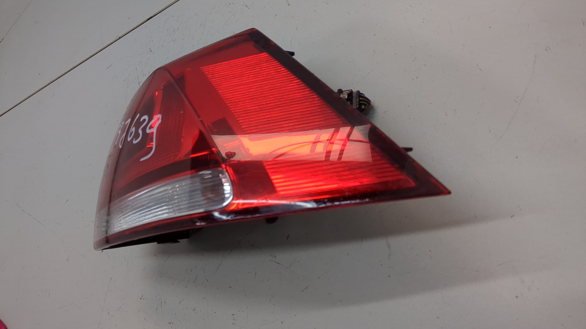 Фонарь задний левый