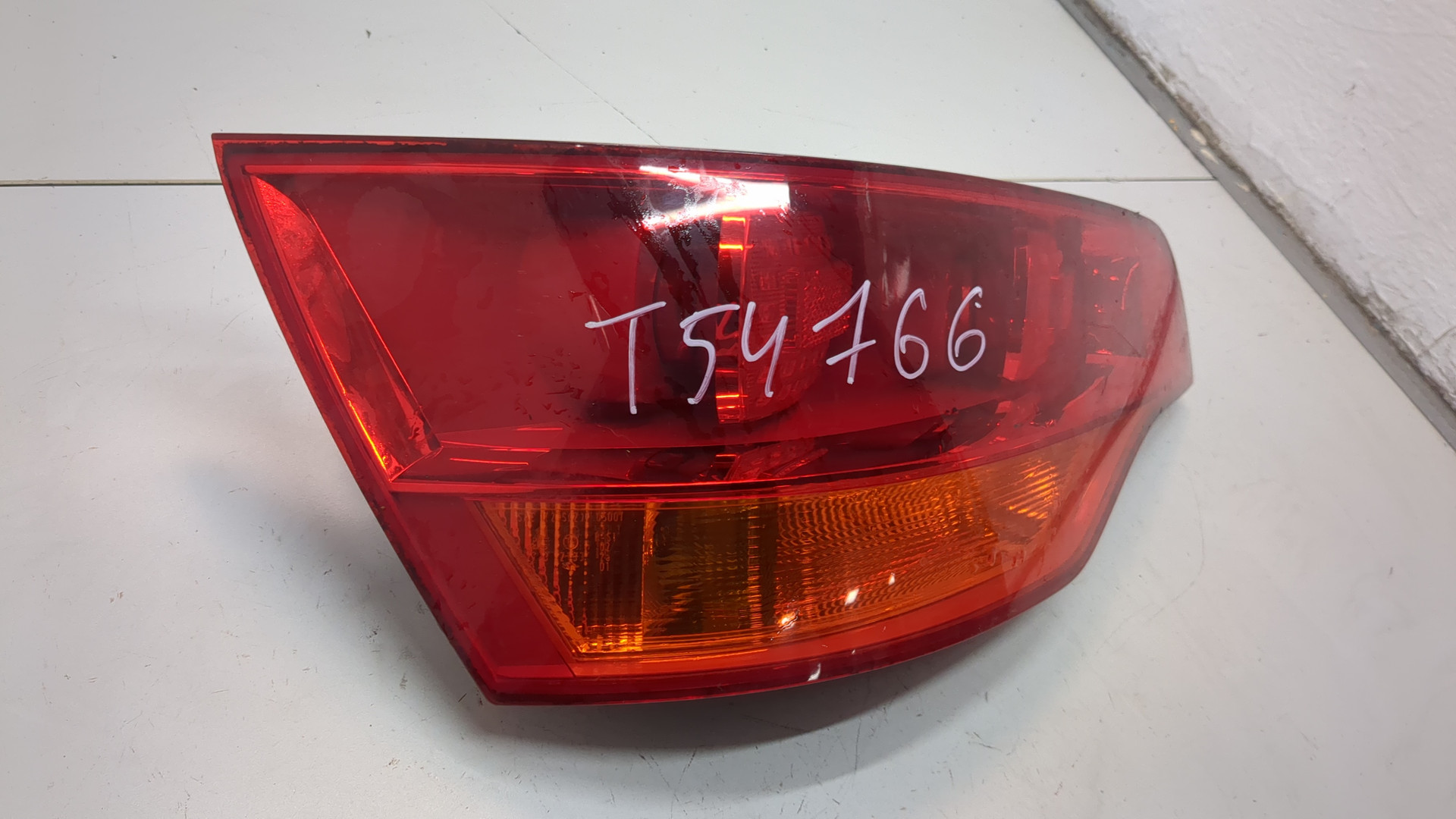 Фонарь задний левый