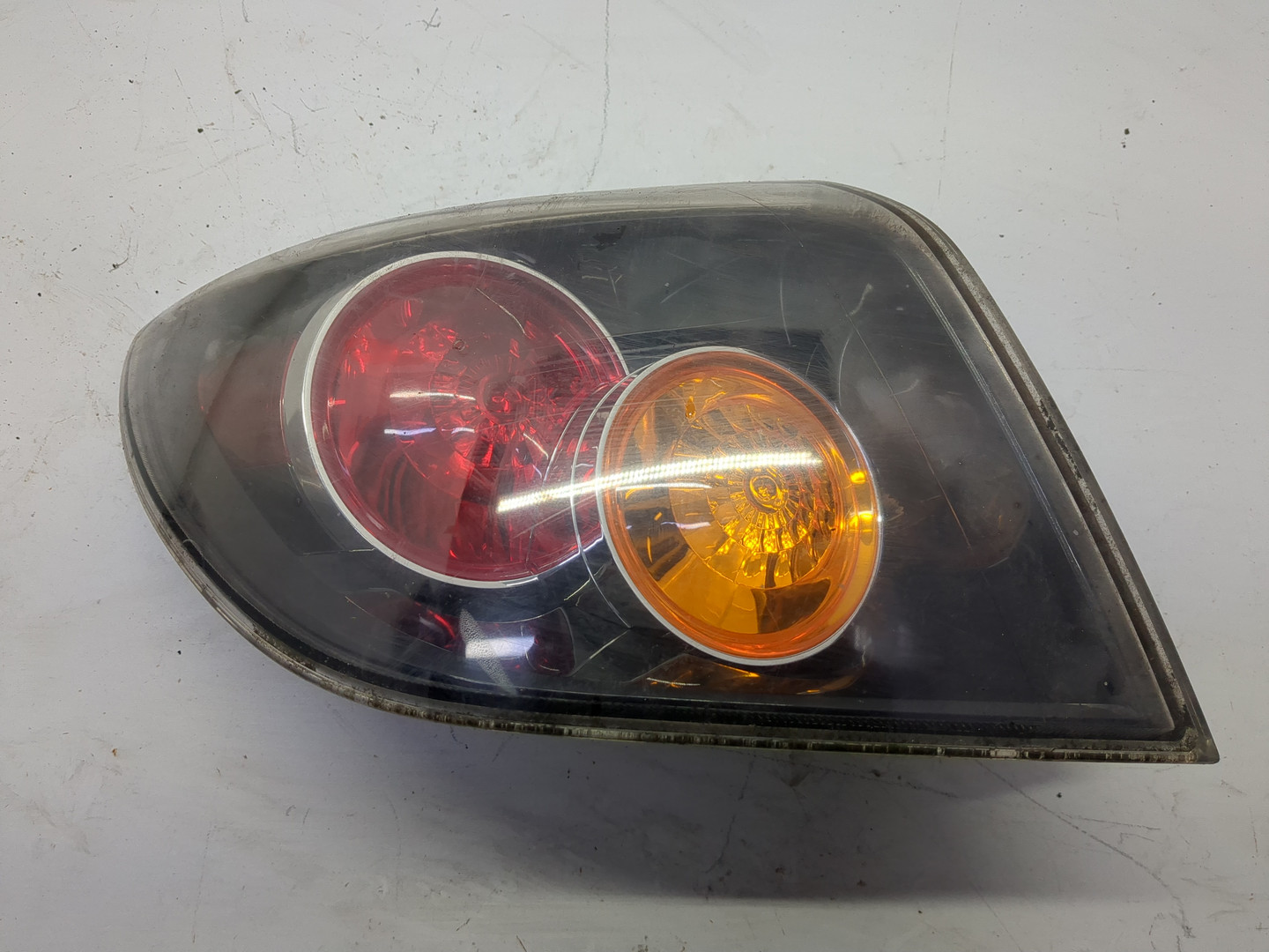 Фонарь задний левый