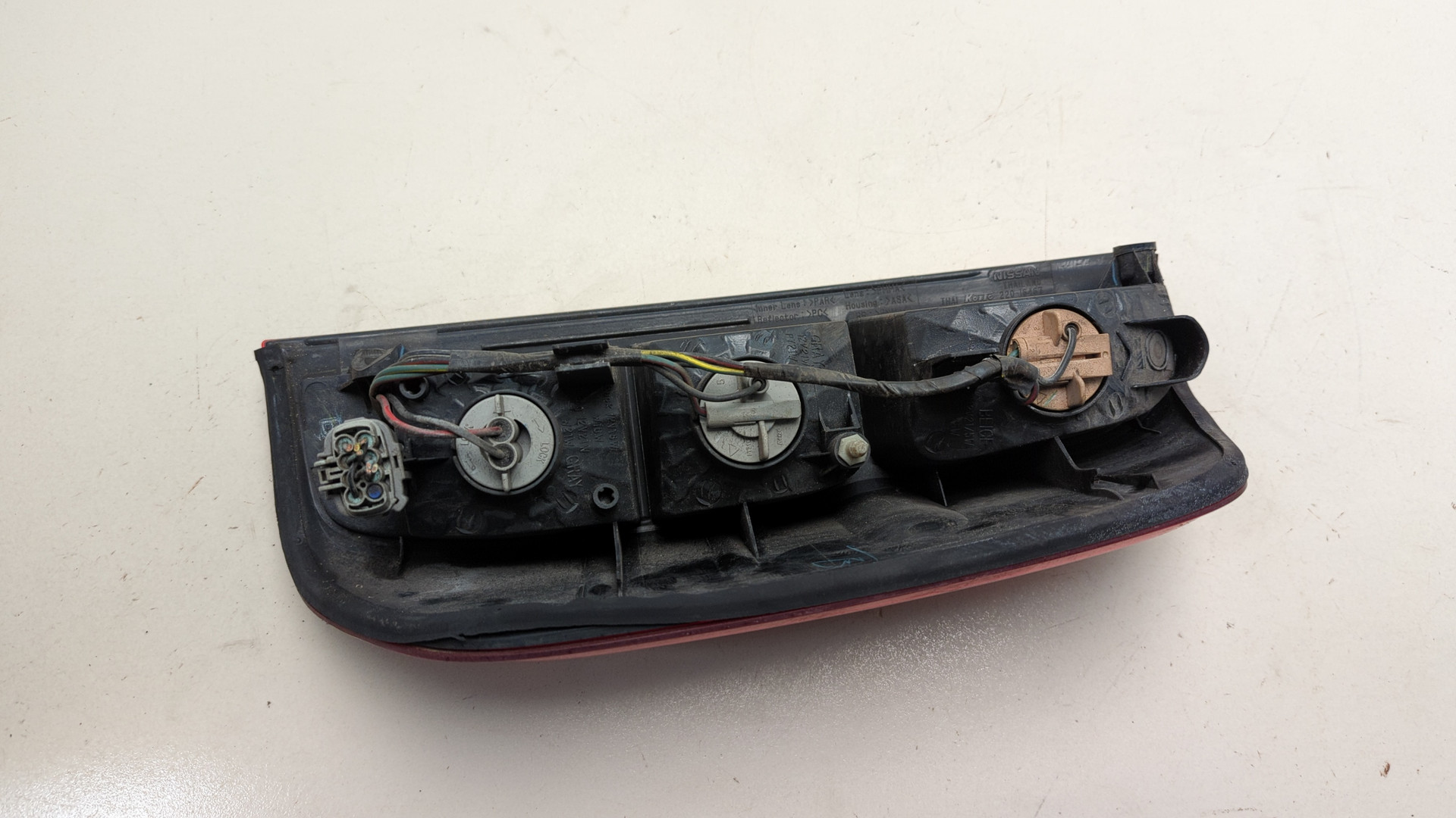 Фонарь задний левый