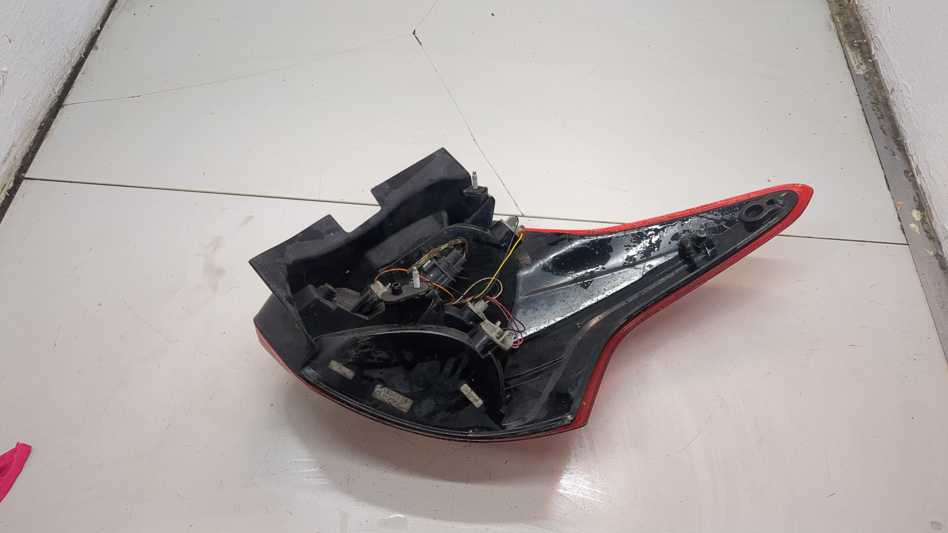 Фонарь задний левый