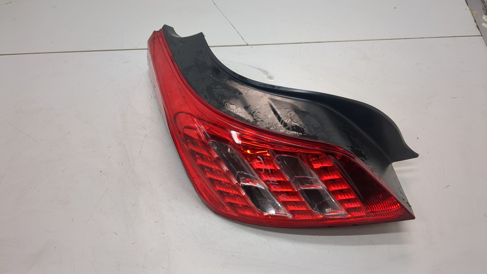 Фонарь задний левый