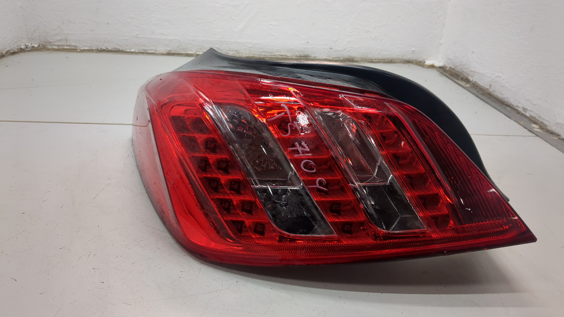 Фонарь задний левый