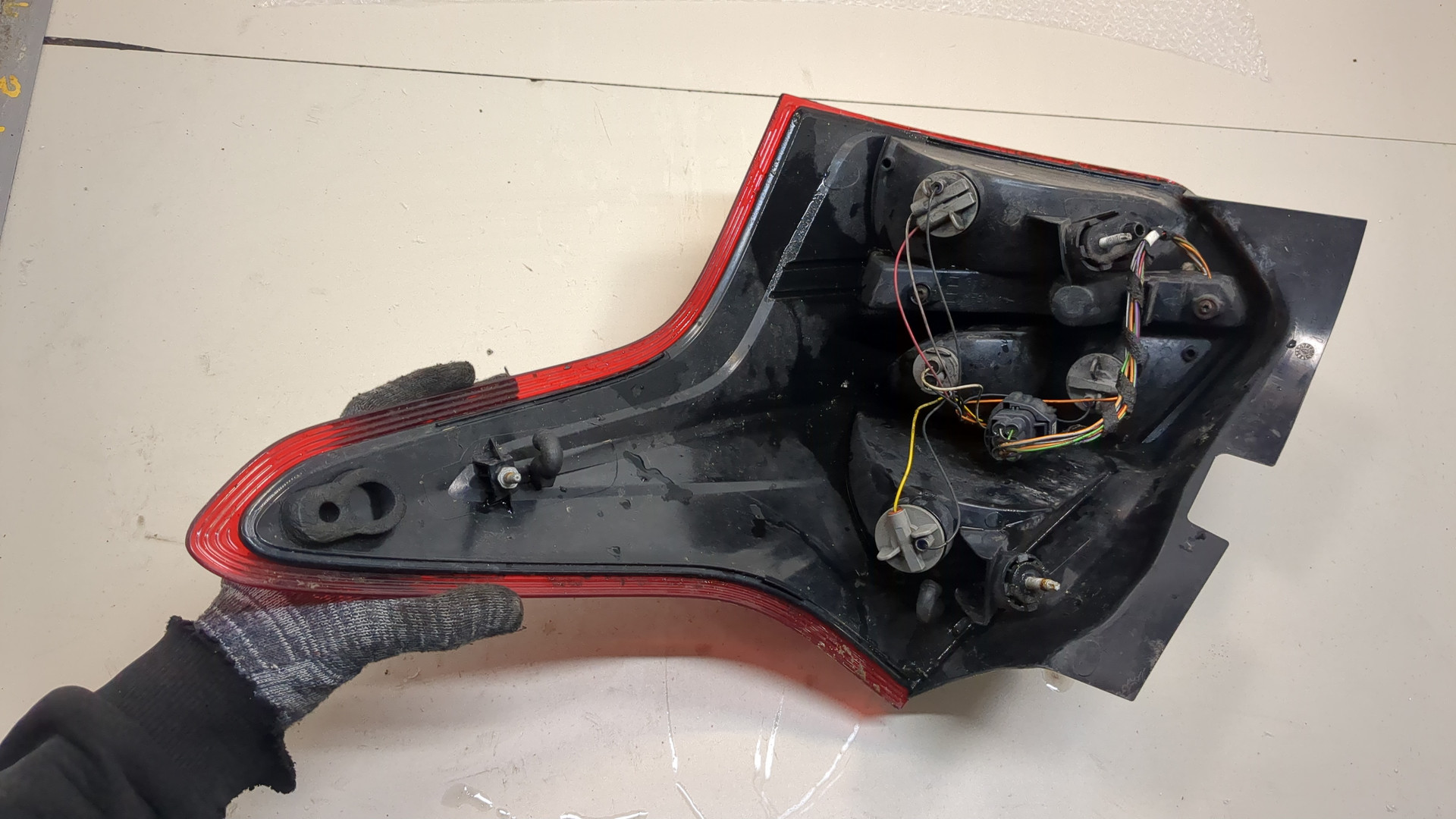 Фонарь задний левый