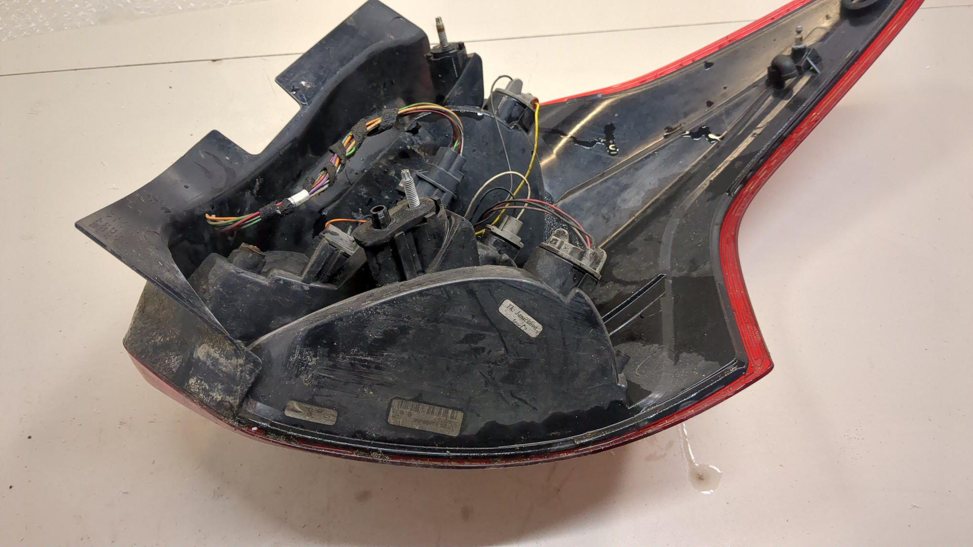 Фонарь задний левый