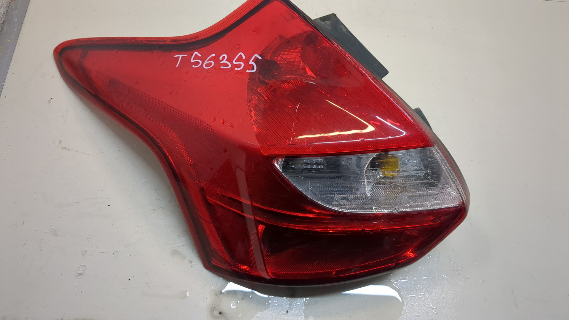 Фонарь задний левый