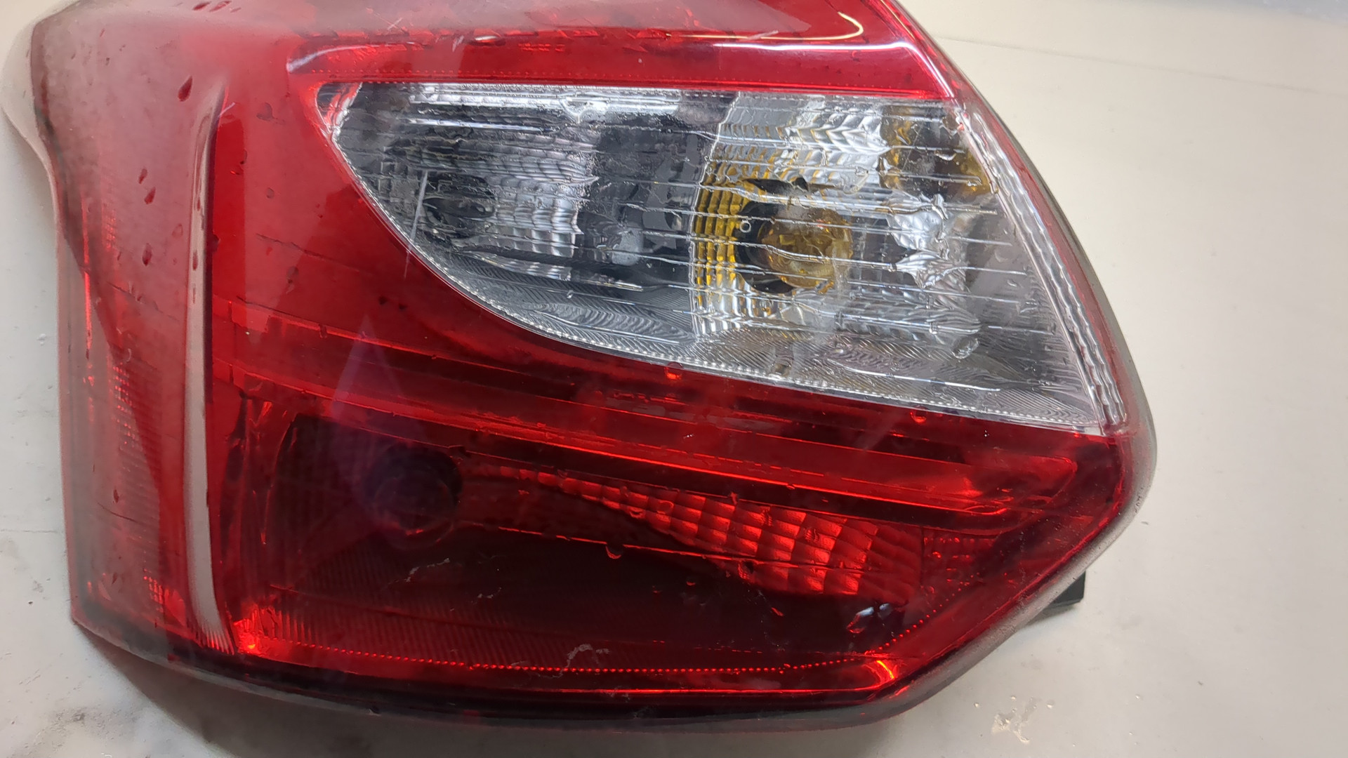 Фонарь задний левый