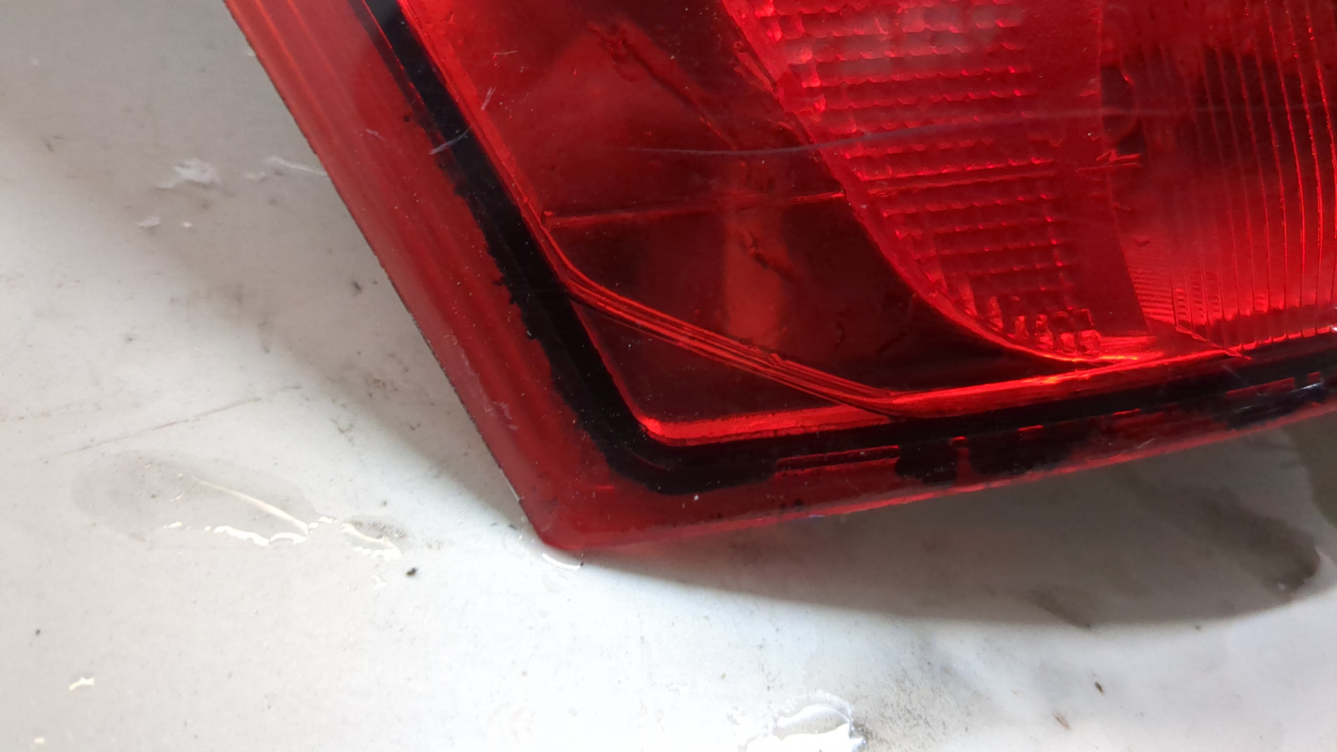 Фонарь задний левый