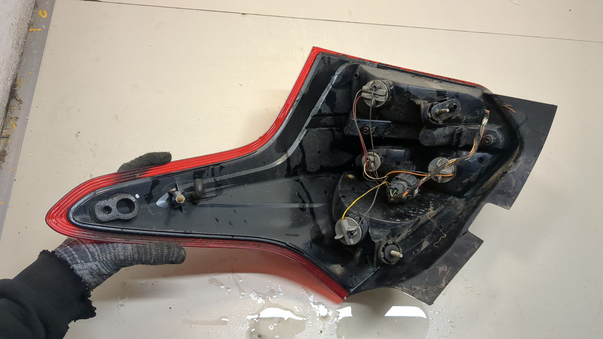 Фонарь задний левый