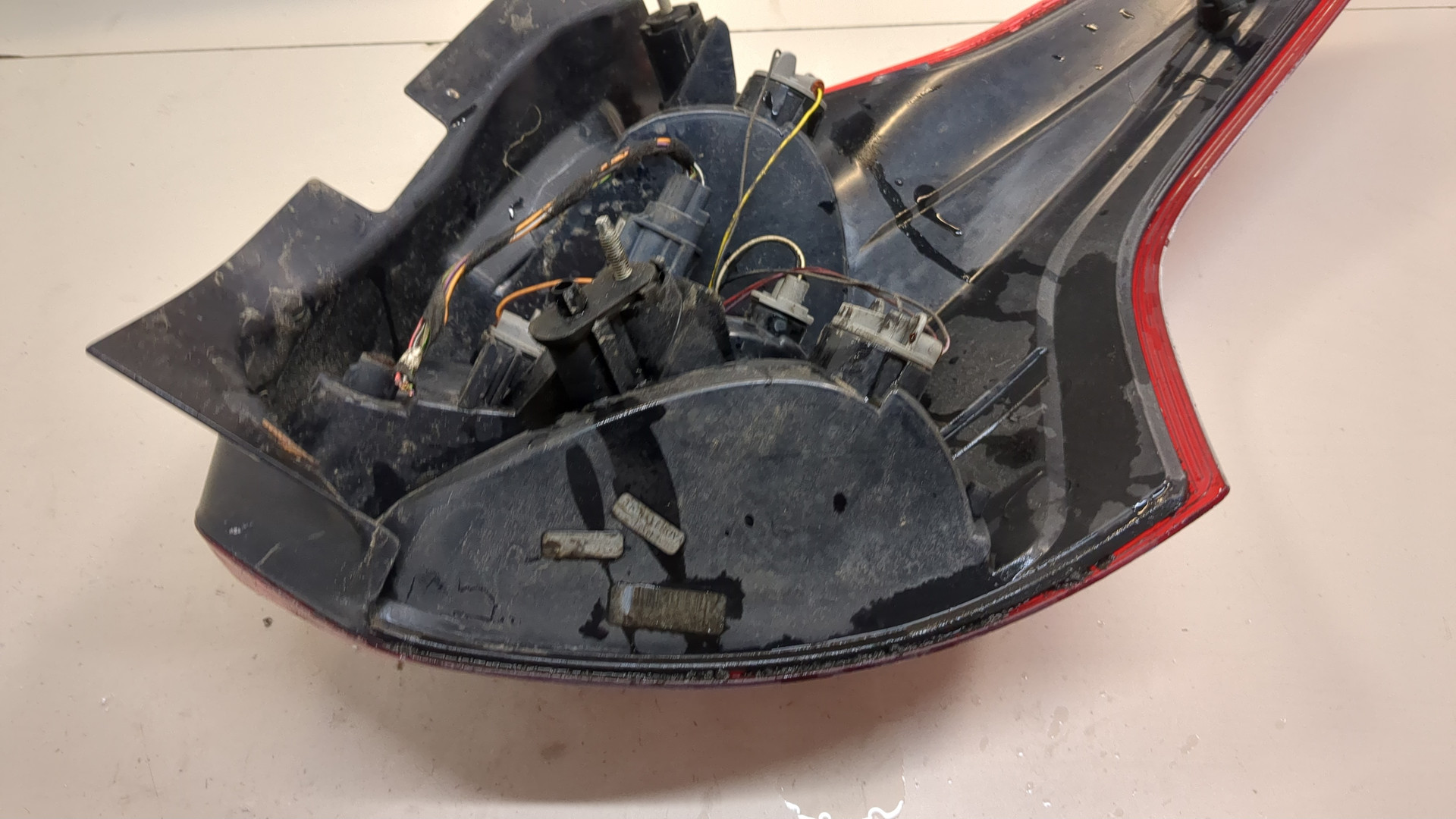 Фонарь задний левый