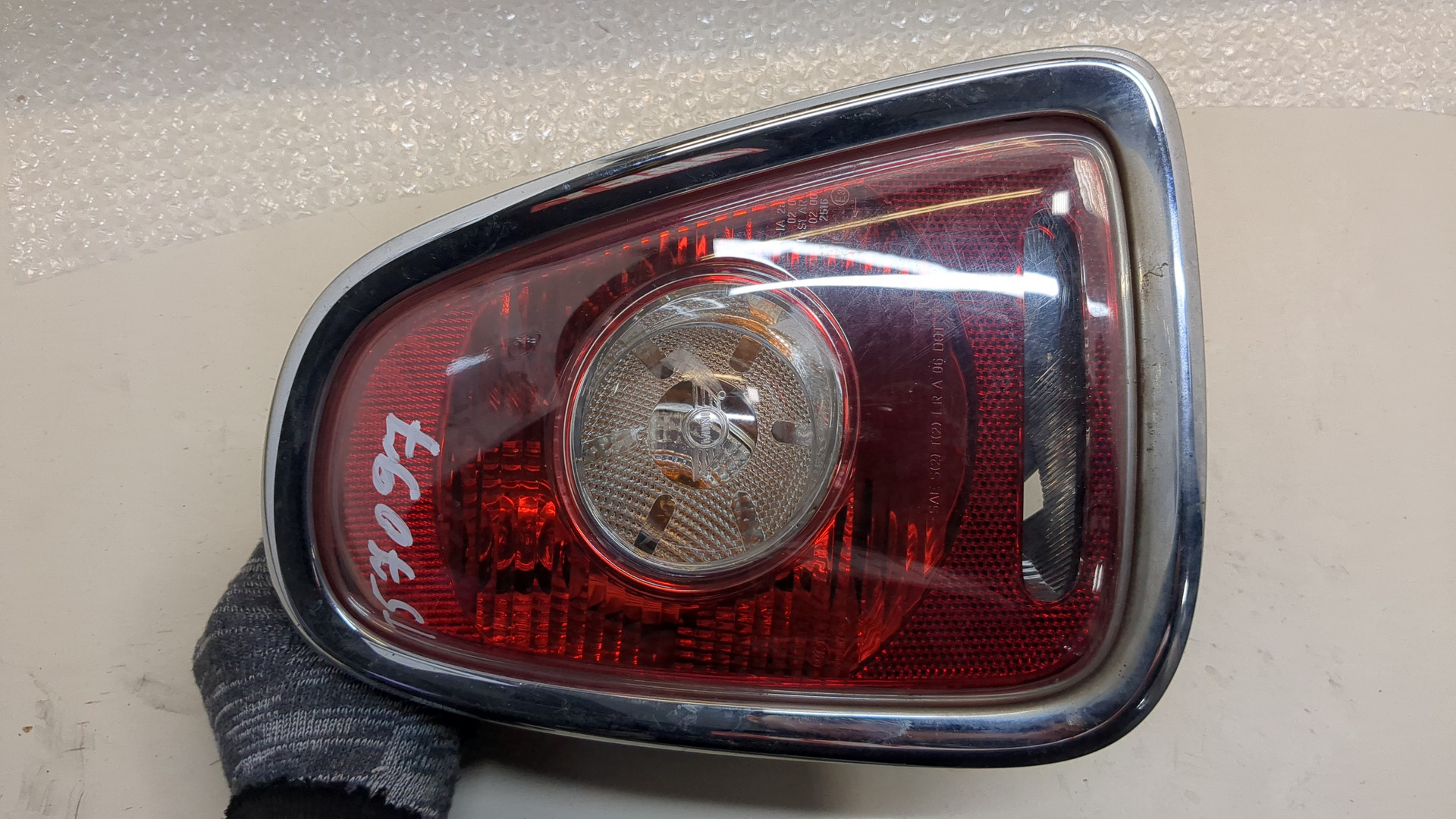 Фонарь задний левый