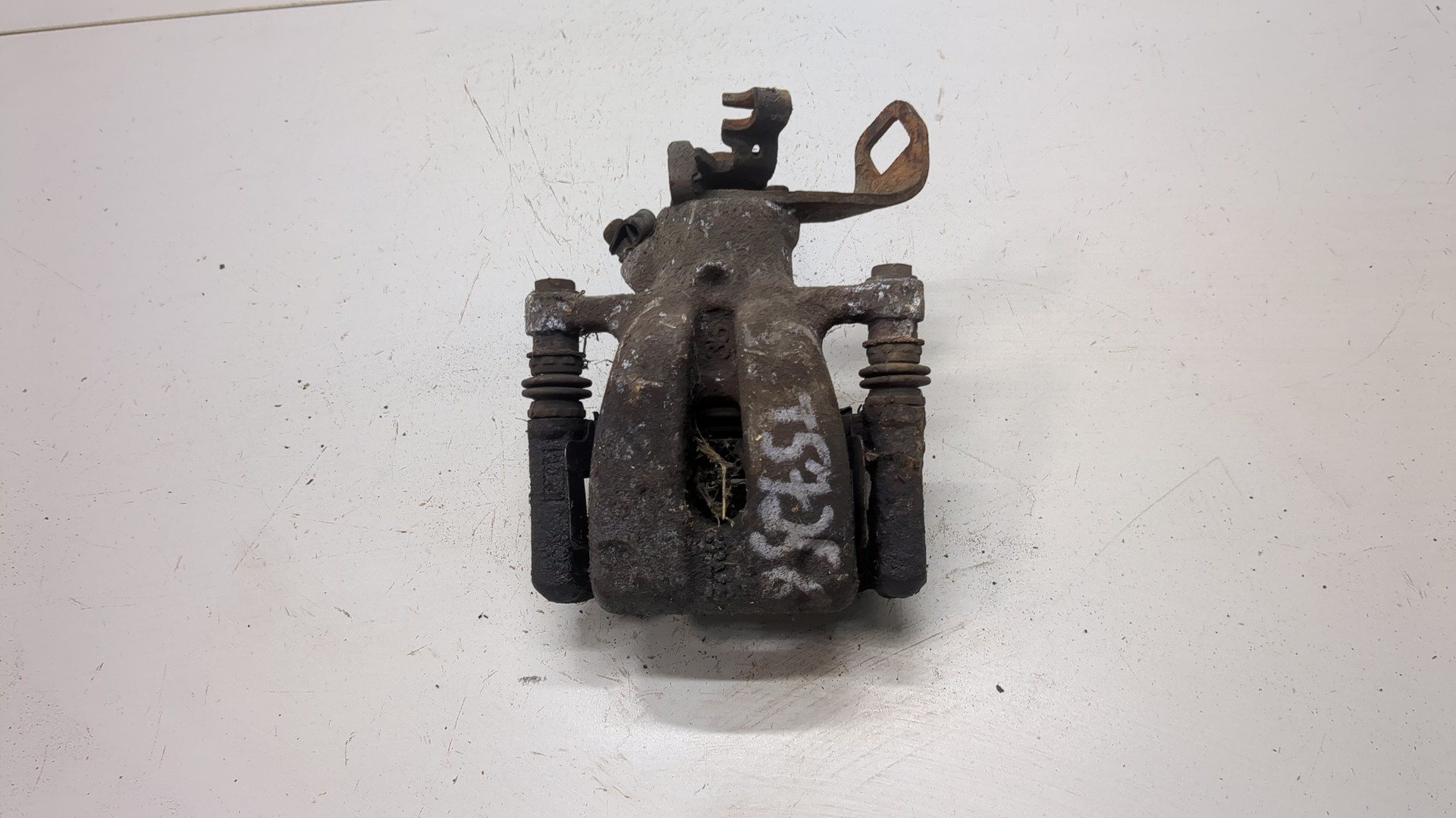 Суппорт задний левый