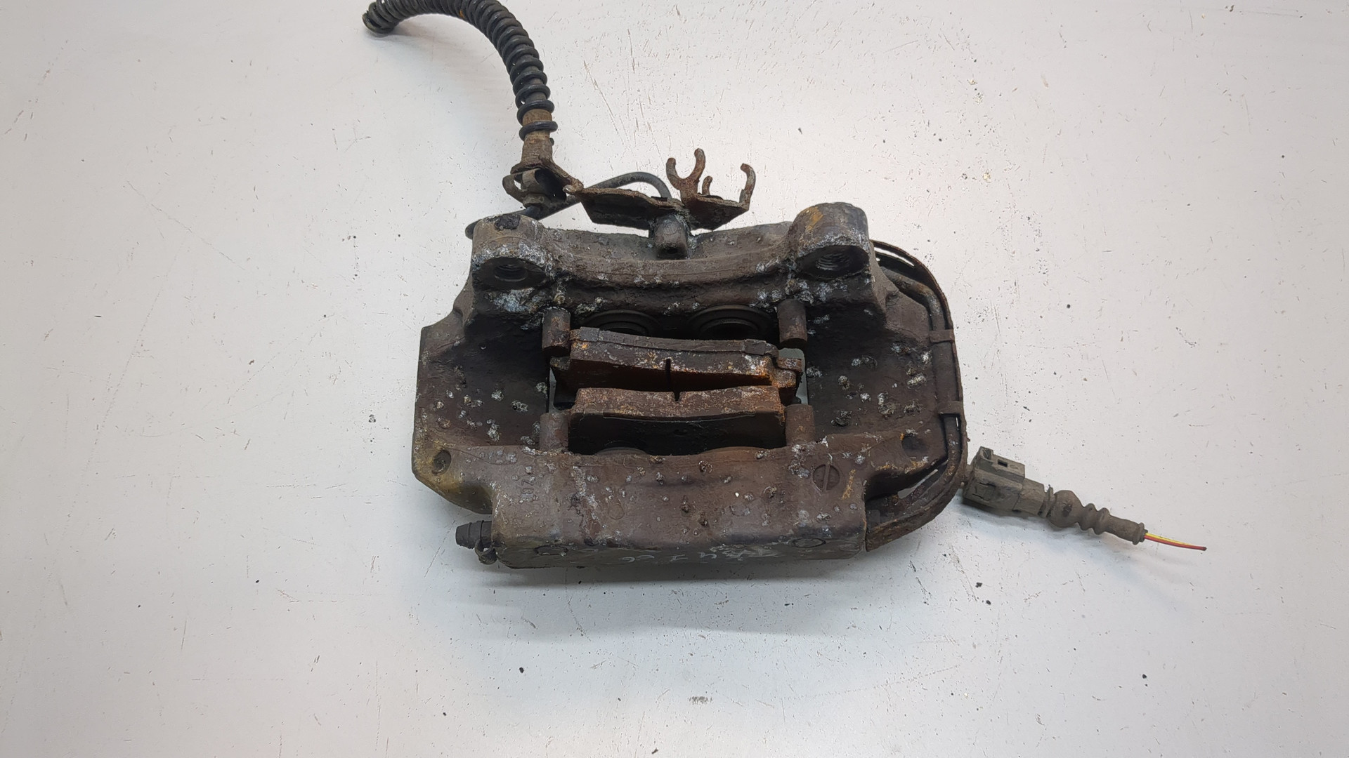 Суппорт задний левый