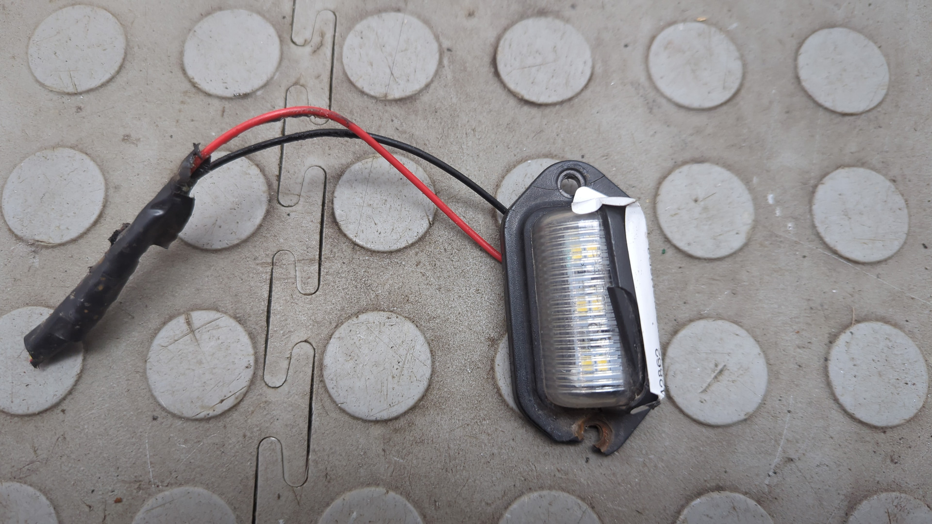 Фонарь подсветки номера