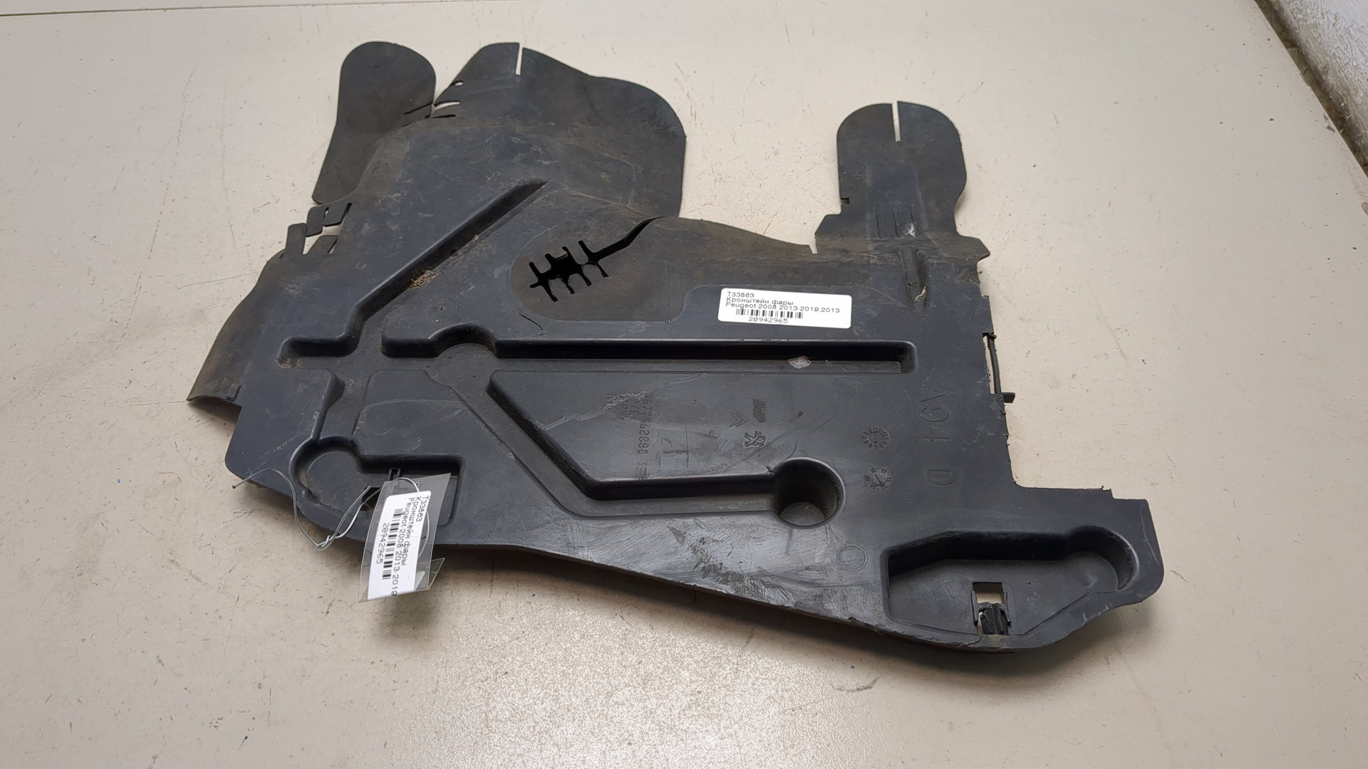 Кронштейн фар правый