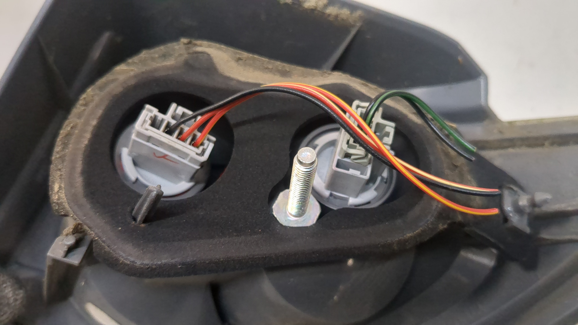 Фонарь задний левый