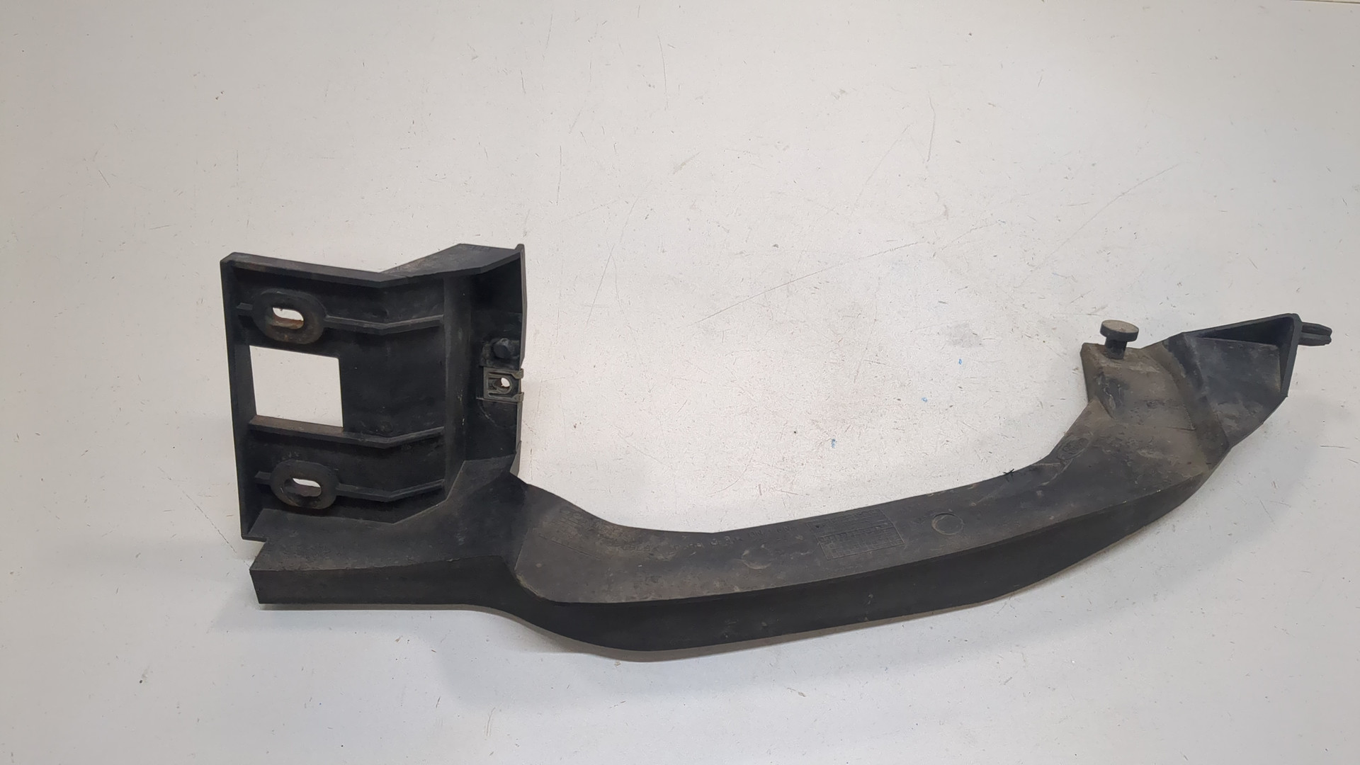 Кронштейн фар левый