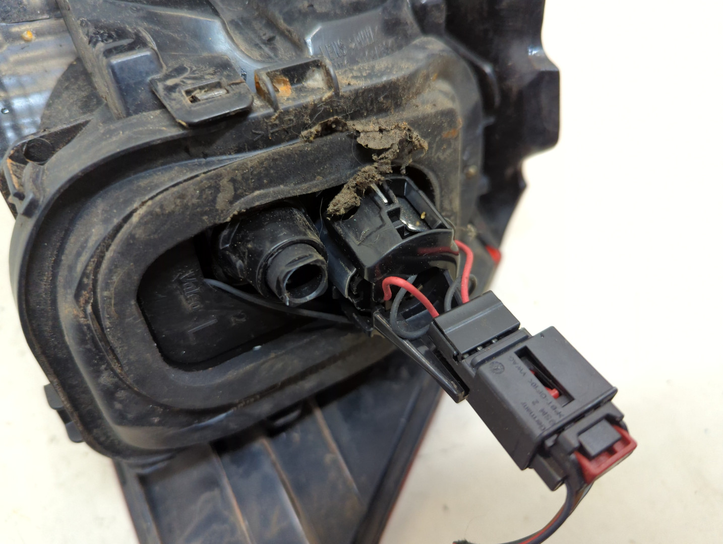 Фонарь задний левый