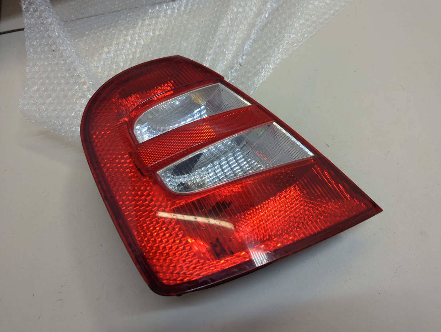 Фонарь задний левый