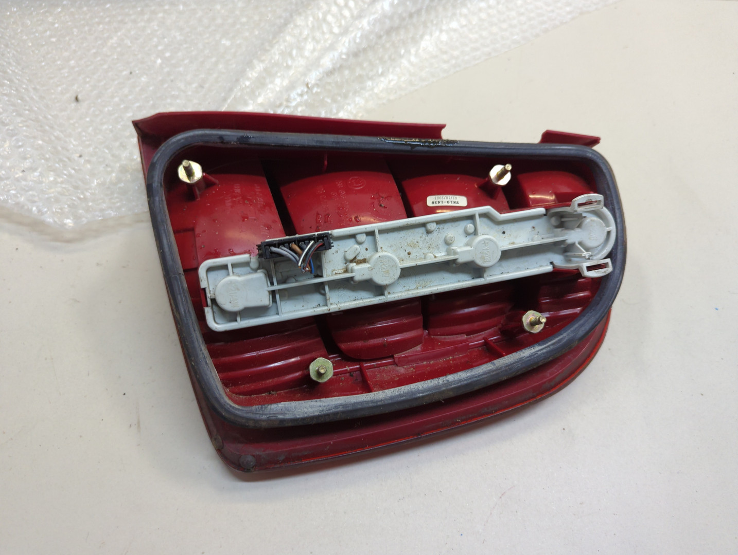 Фонарь задний левый