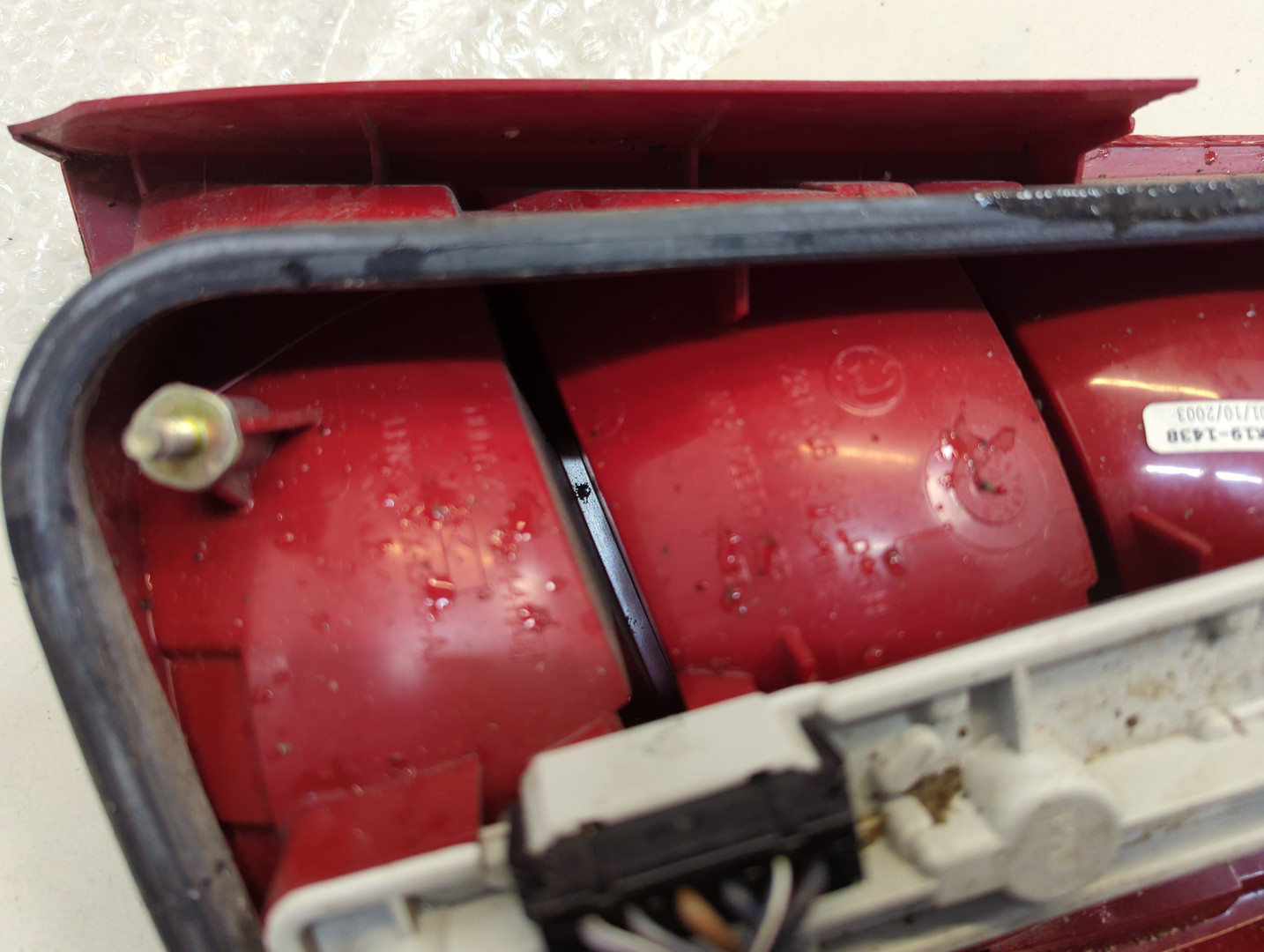 Фонарь задний левый