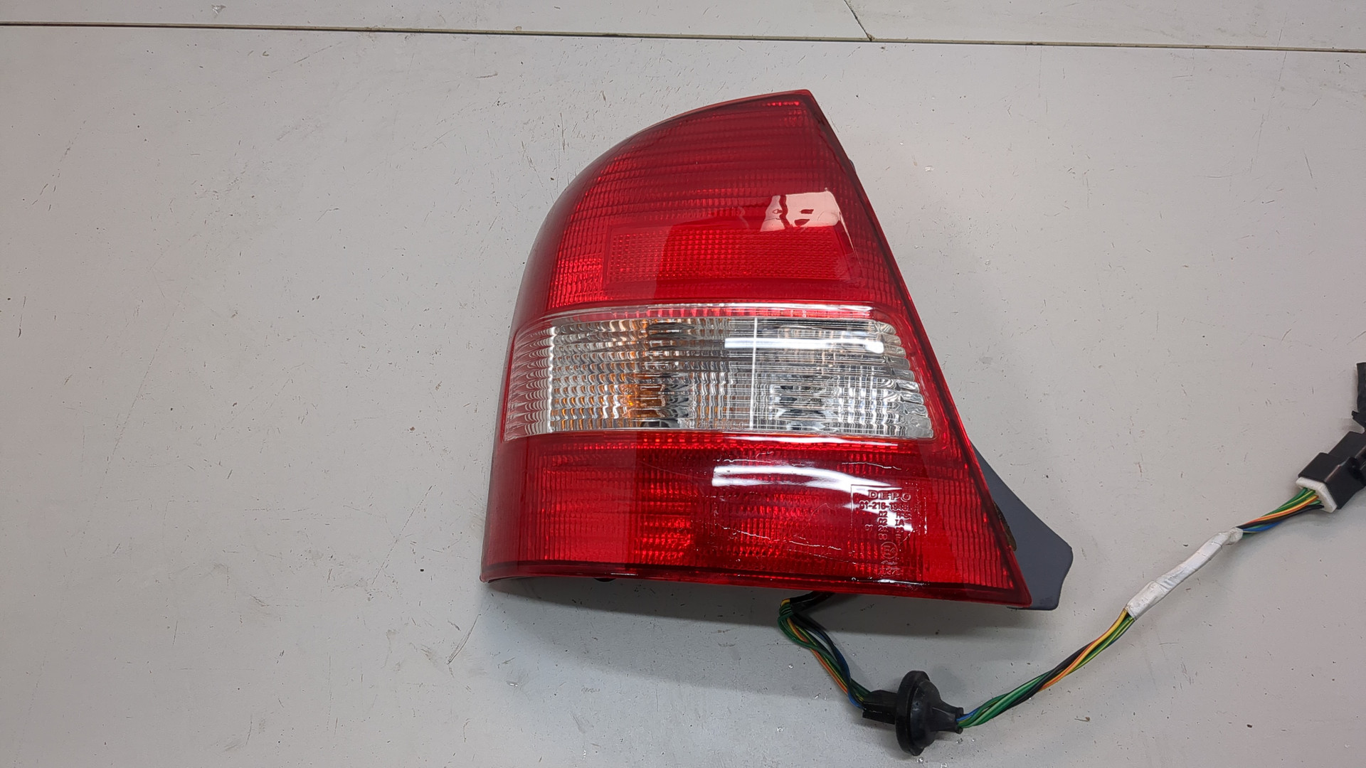 Фонарь задний левый