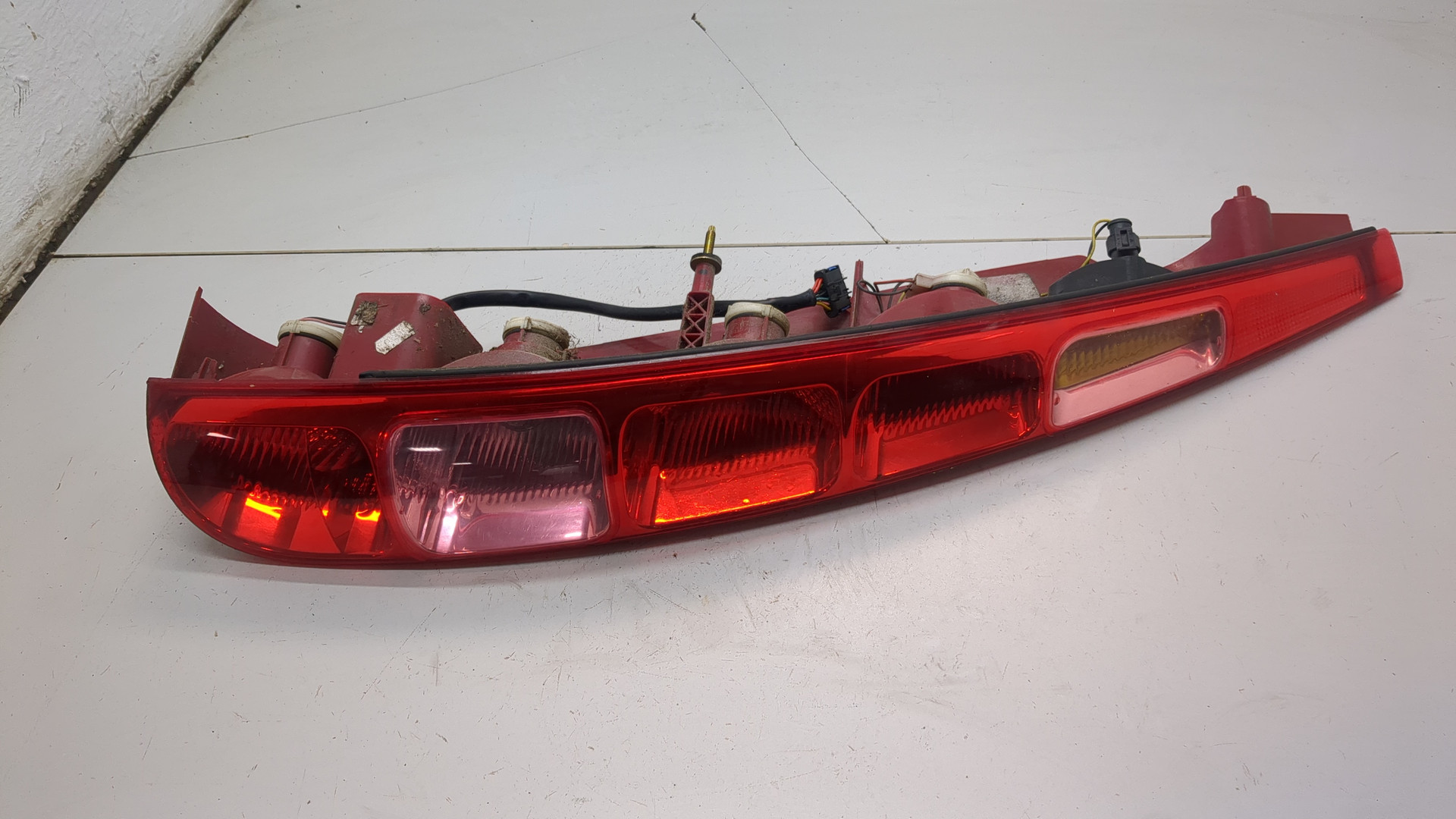 Фонарь задний левый