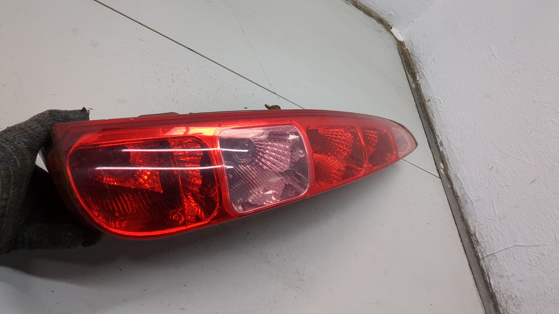 Фонарь задний левый