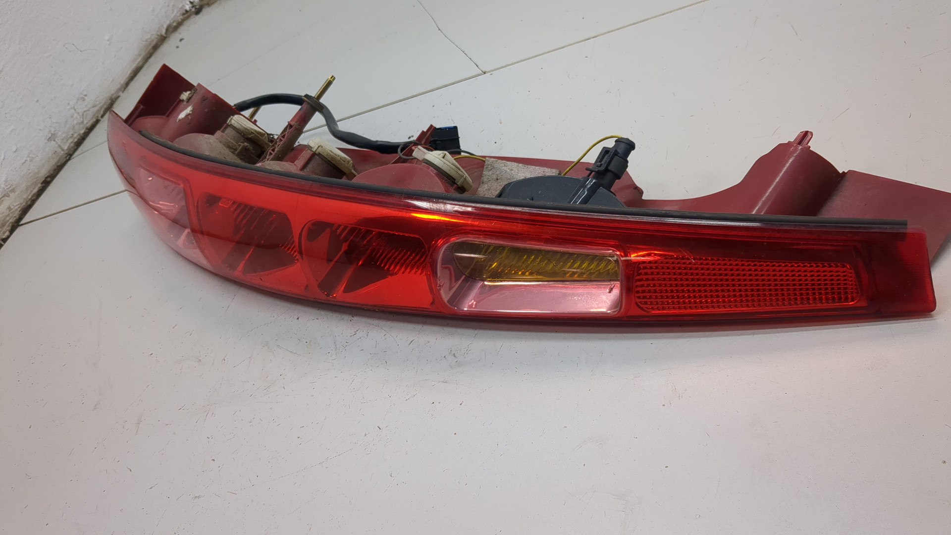 Фонарь задний левый