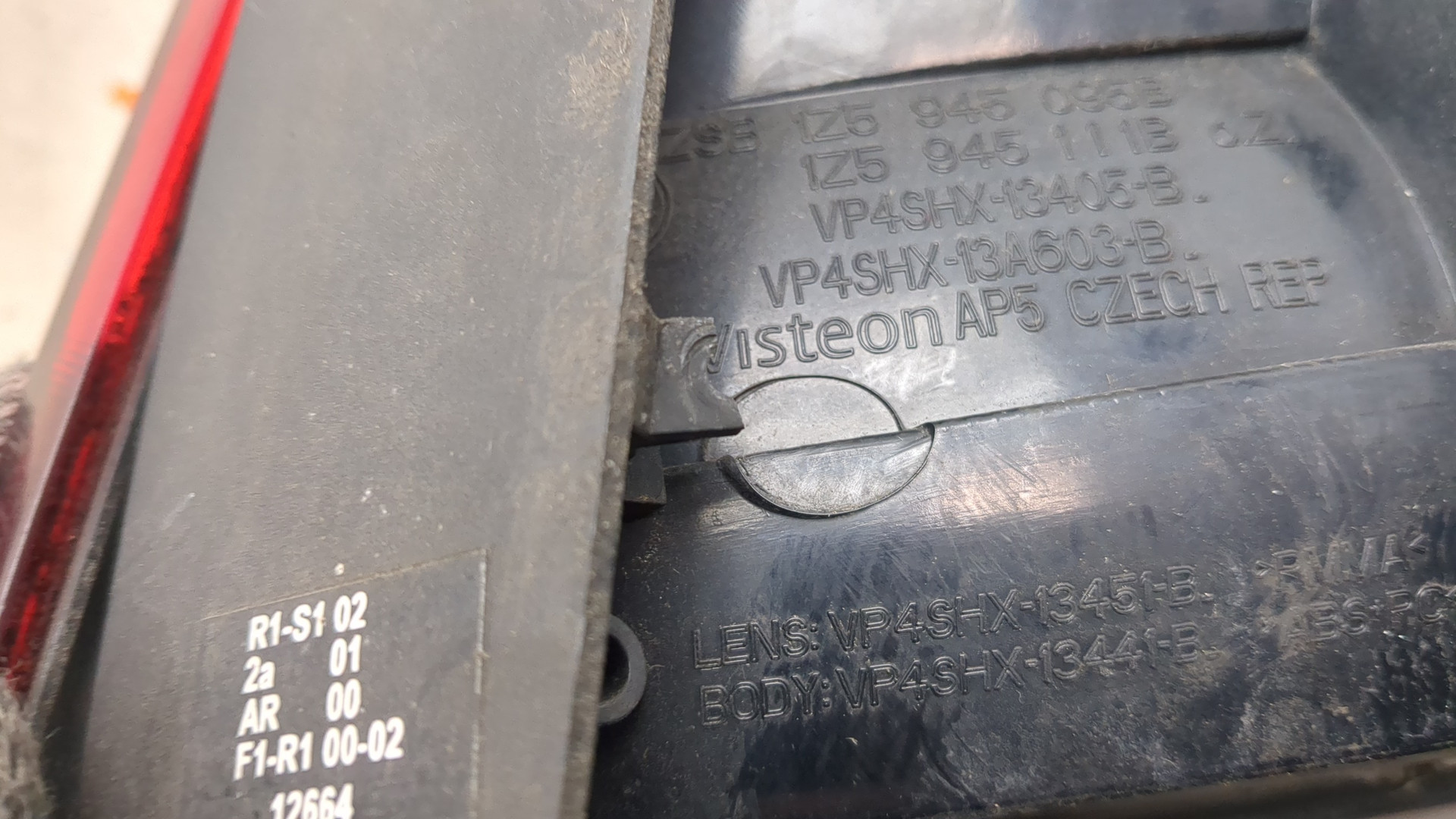 Фонарь задний левый