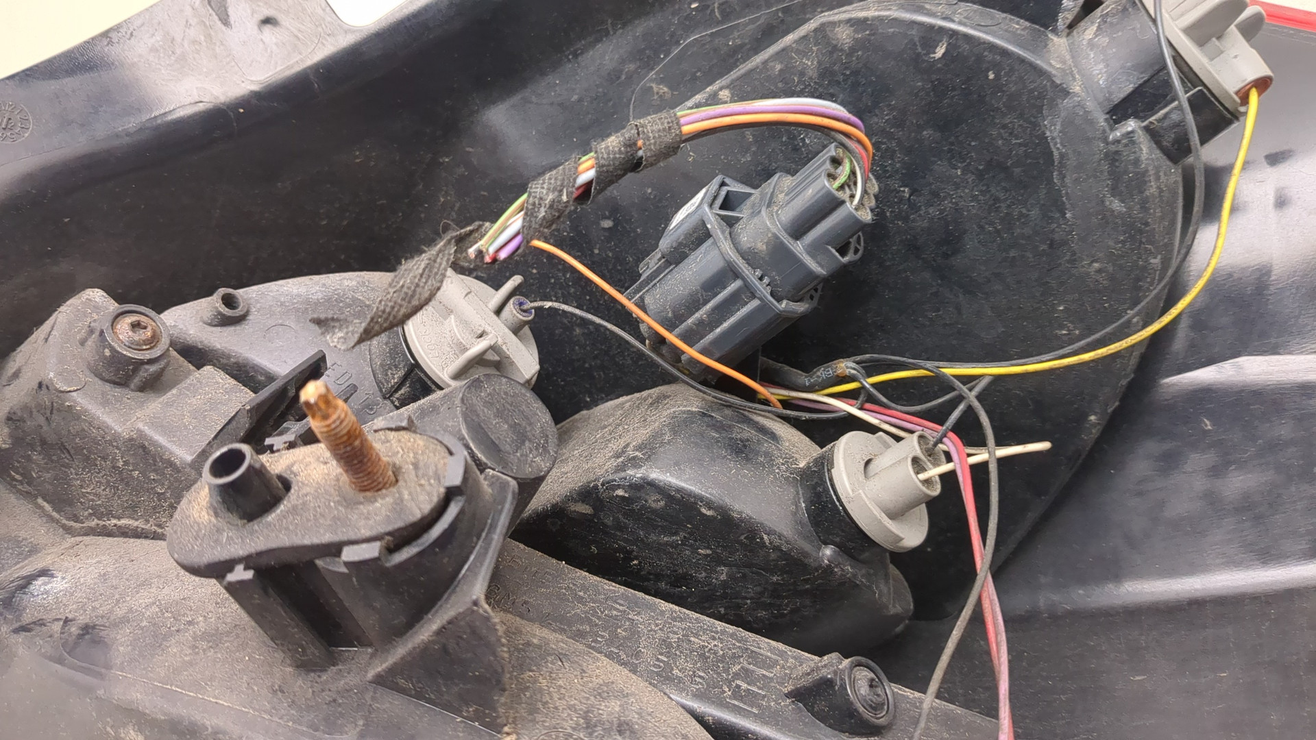 Фонарь задний левый