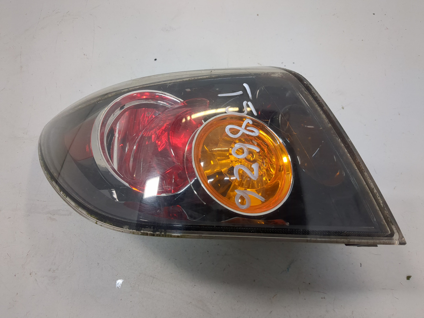 Фонарь задний левый