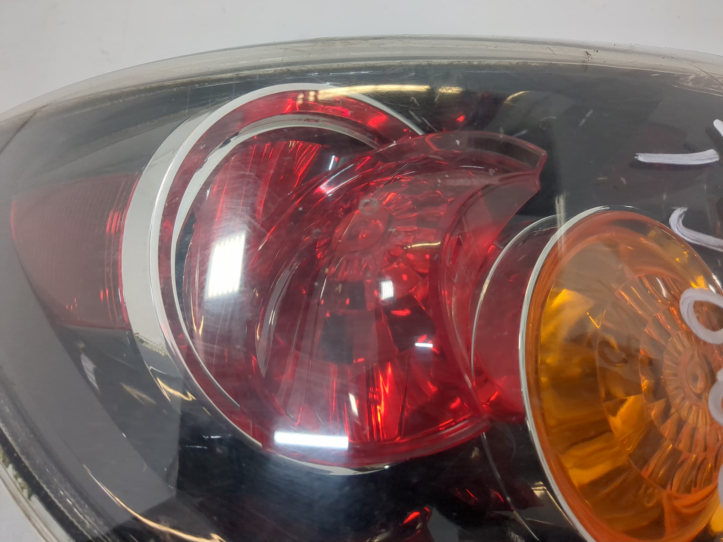 Фонарь задний левый