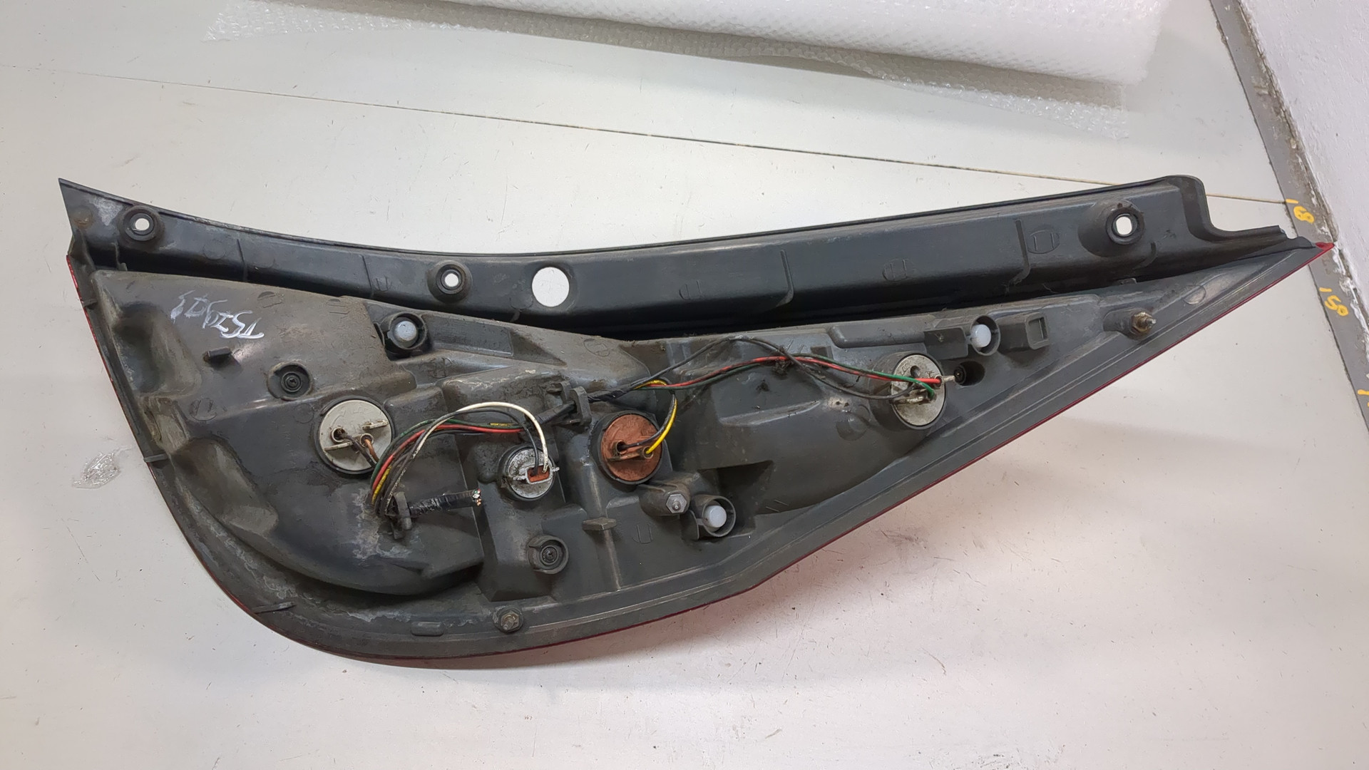 Фонарь задний левый