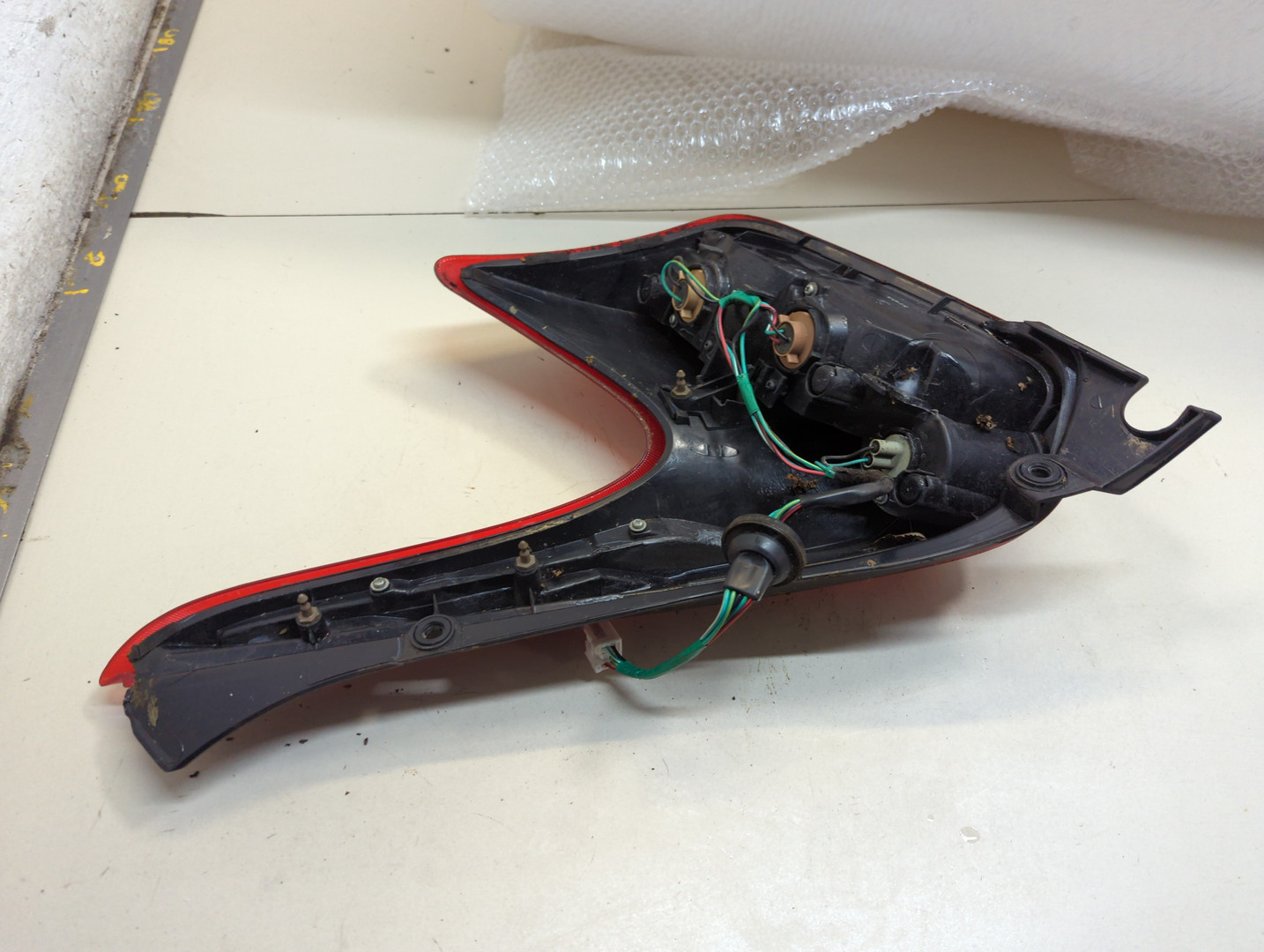 Фонарь задний левый