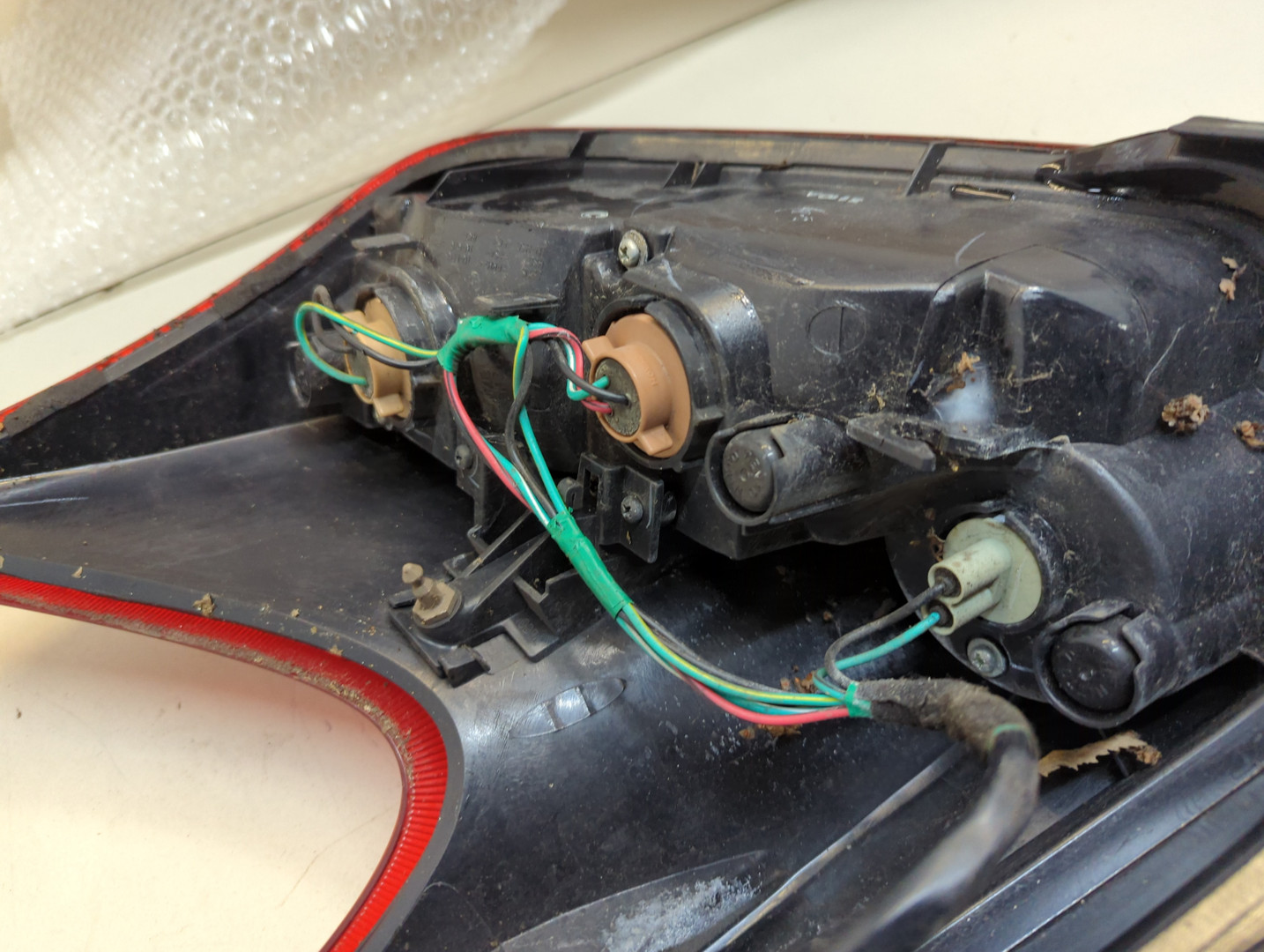 Фонарь задний левый