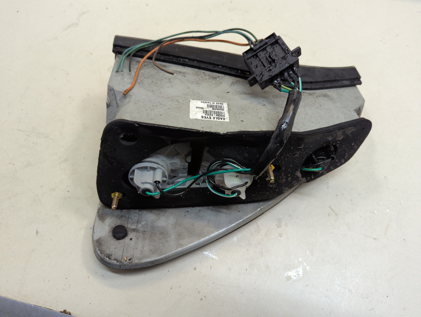 Фонарь задний левый