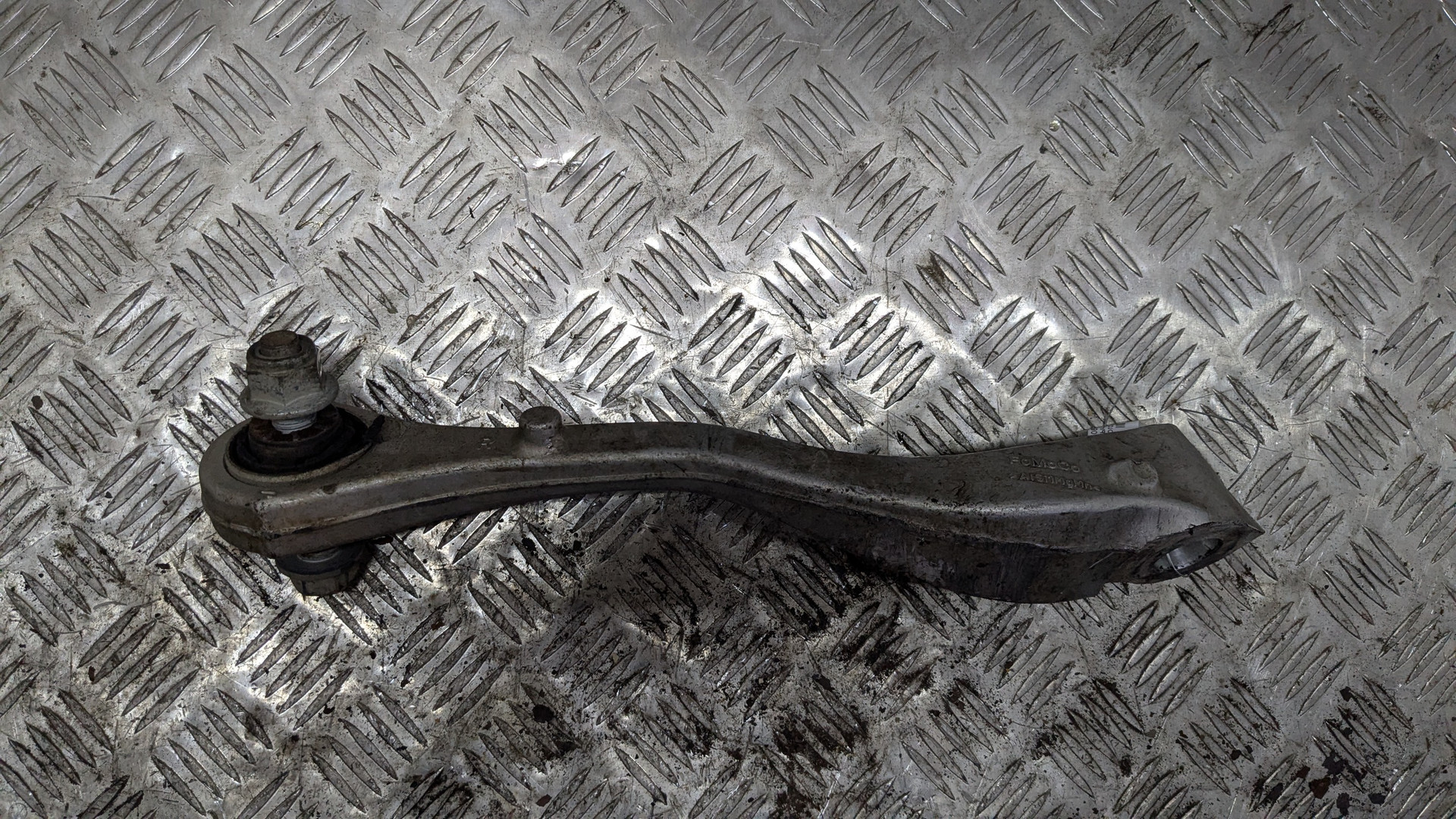 Рычаг задний правый