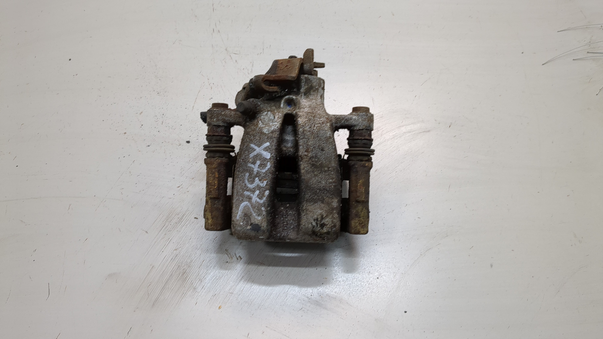 Суппорт задний левый