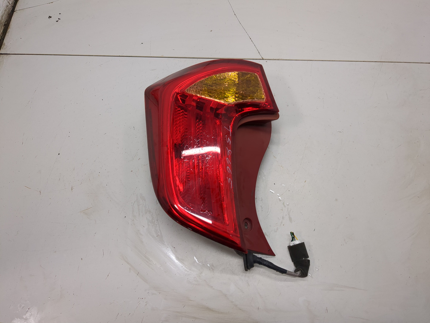 Фонарь задний левый