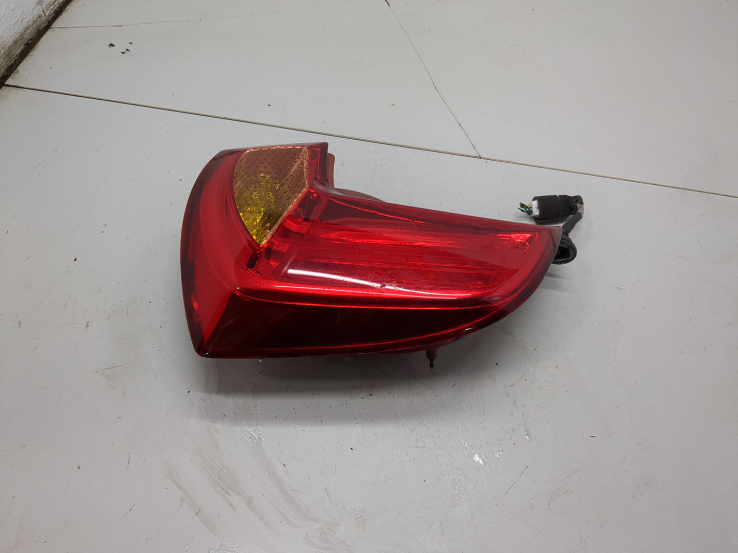 Фонарь задний левый