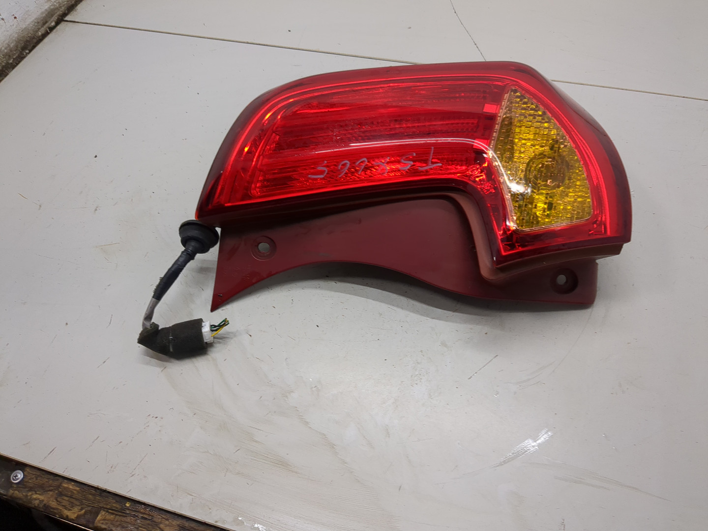 Фонарь задний левый