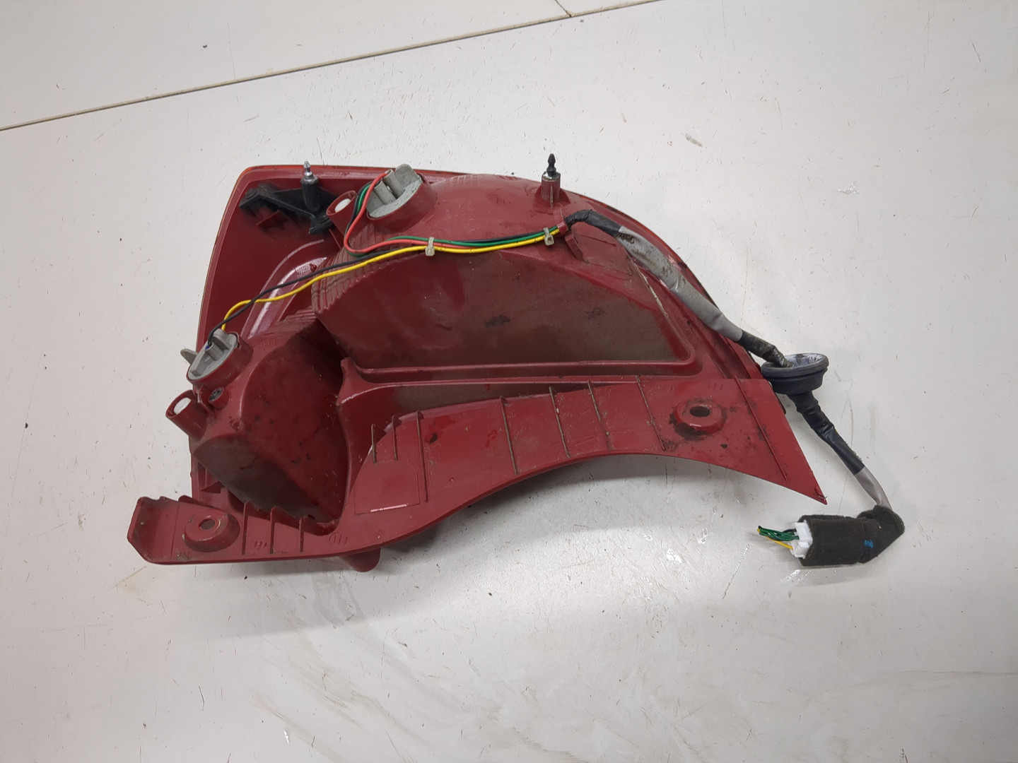 Фонарь задний левый