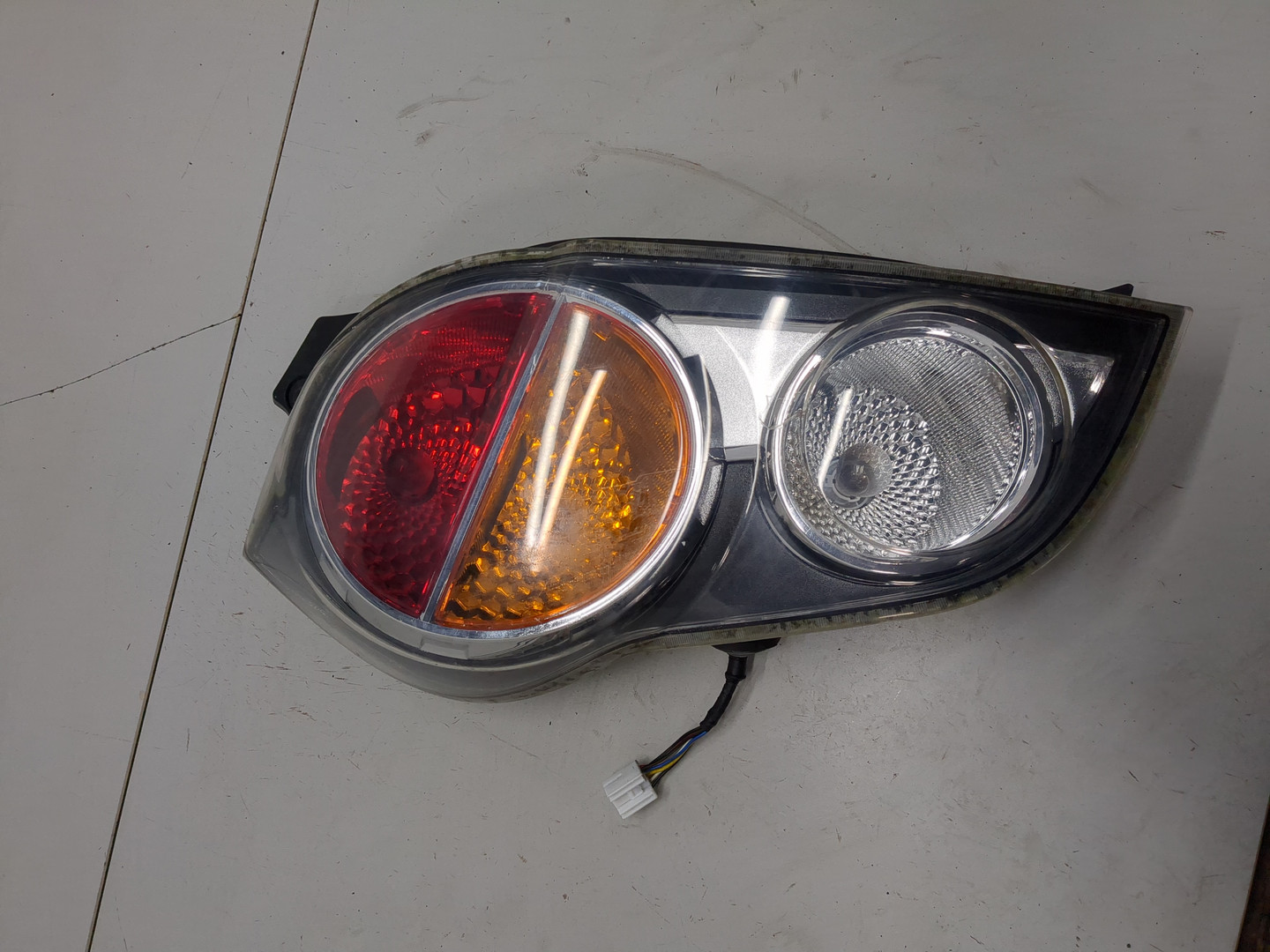 Фонарь задний левый