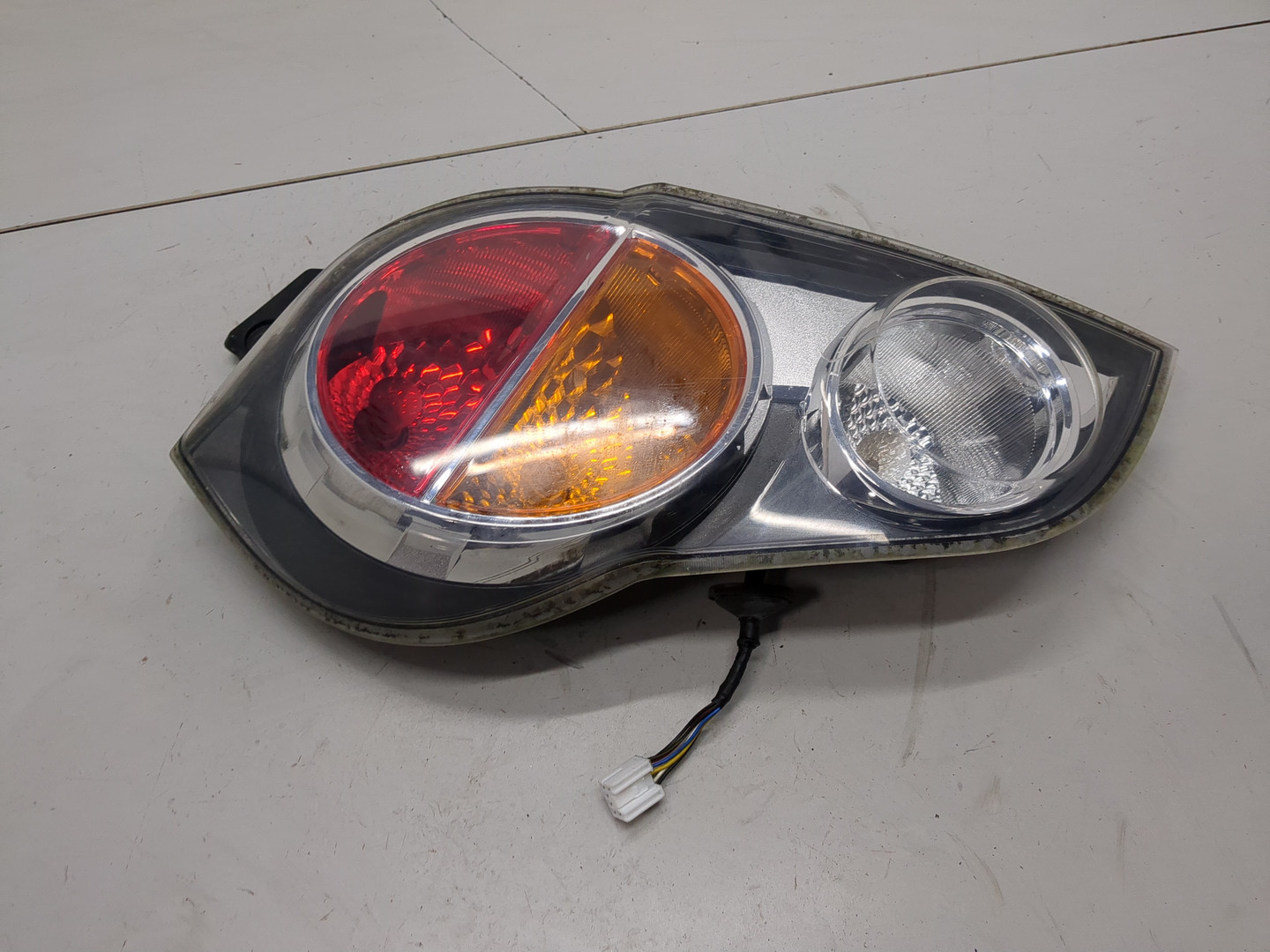 Фонарь задний левый