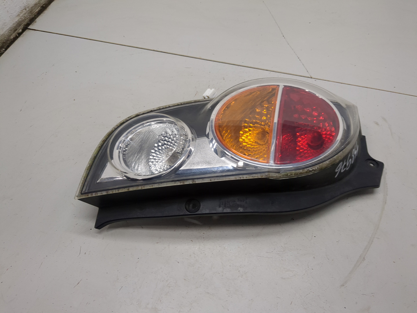 Фонарь задний левый