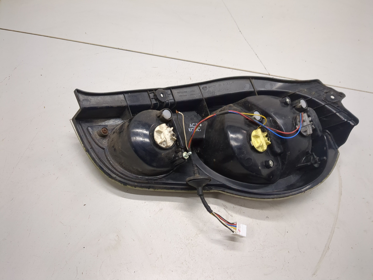 Фонарь задний левый